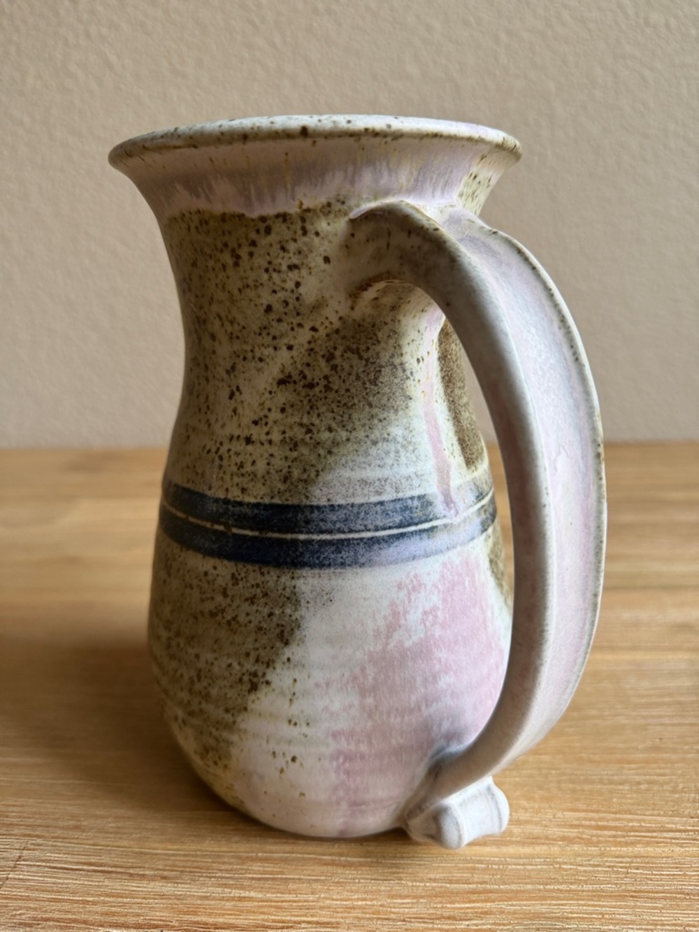 Handcrafted Speckled Ceramic Pitcher in Beige with Blue Stripe - Picture 6 of 13